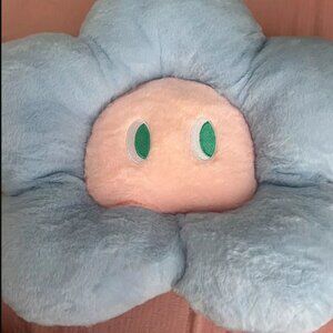 Smiling flower pillow
